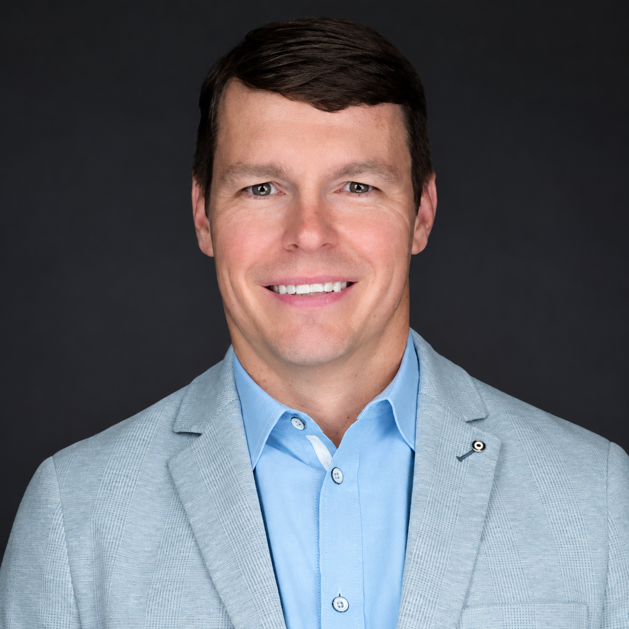 Brandon C. Powell, founder and CEO of HatchWorks AI and author of The AI ROI Engine